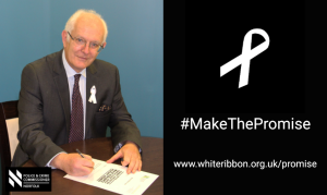 Giles Orpen Smellie signs White Ribbon Promise