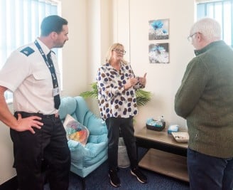 PCC Giles Orpen-Smellie talks to staff in new counselling room