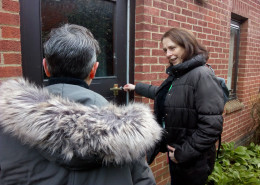 St Martin's support workers unlocking a property door