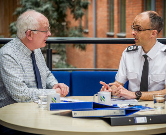 PCC Giles Orpen-Smellie talking to Chief Constable Paul Sanford