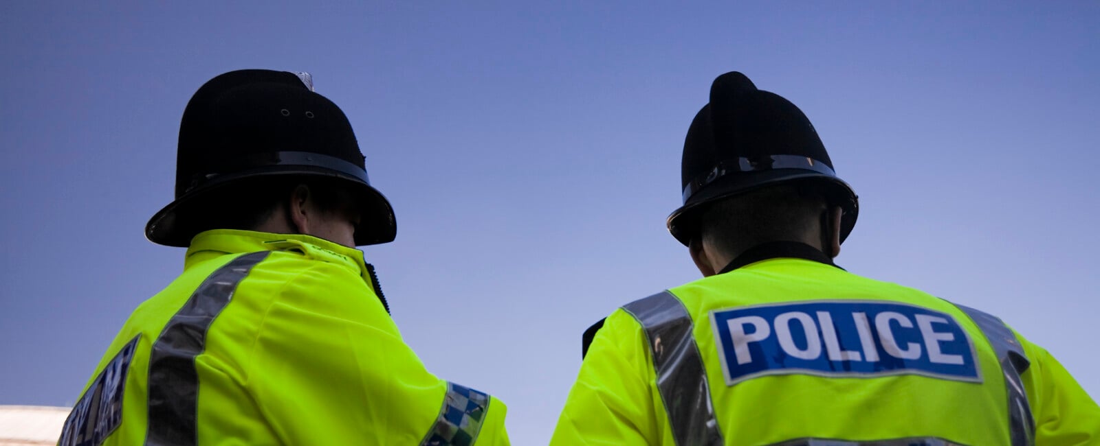 Two police officers in high vis jackets