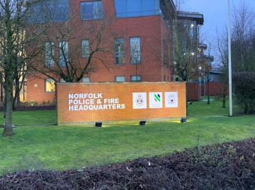 night time image of the outside of Norfolk police headquarters 