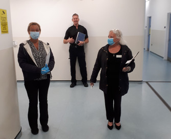 Independent Custody Visitors wearing face masks during visit to police station