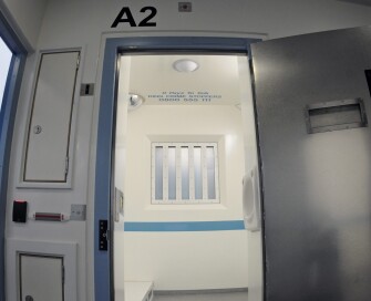 Open police cell door