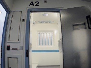 Open police cell door