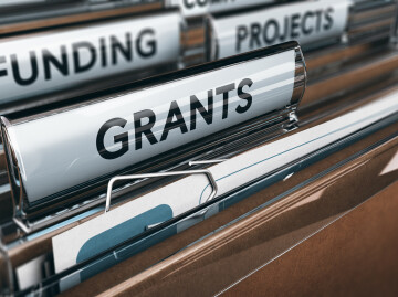 Grants - image of titled tabs in filing cabinet